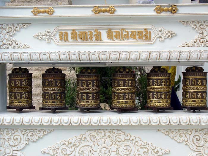 Photograph or image of Mani: Tibetan Mani wheels at Amitabha Buddhist Centre , Singapore .