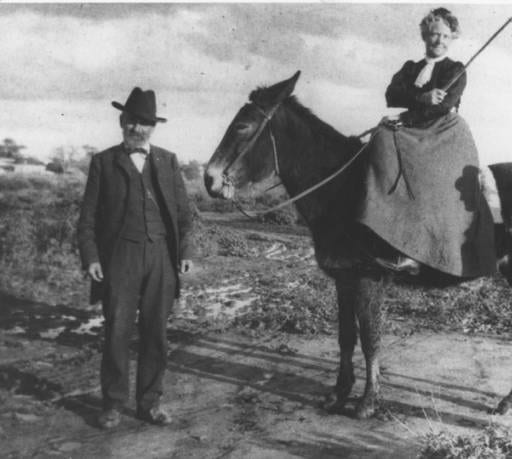 Photograph or image of Maud: Retired U.S. Army Chaplain Winfield S. Scott and his wife Helen pose in 1900 with their mule "Old Maud" in Scottsdale, Arizona , wh