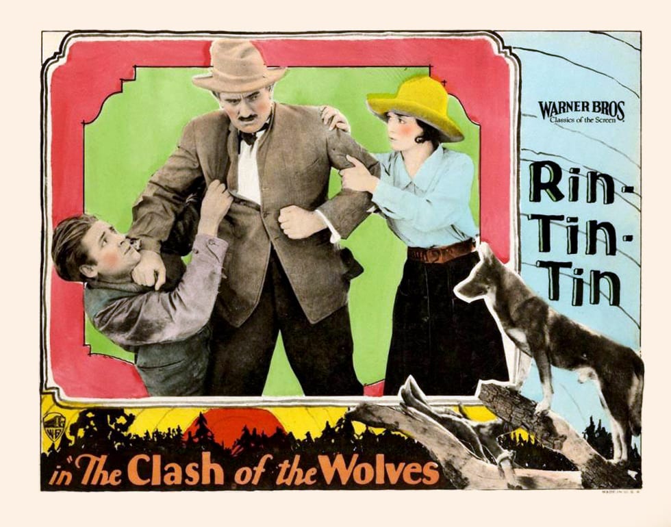 Photograph or image of Rin Tin Tin: Lobby card for the American western film The Clash of the Wolves (1925) with Charles Farrell, Pat Hartigan, and June Marlowe